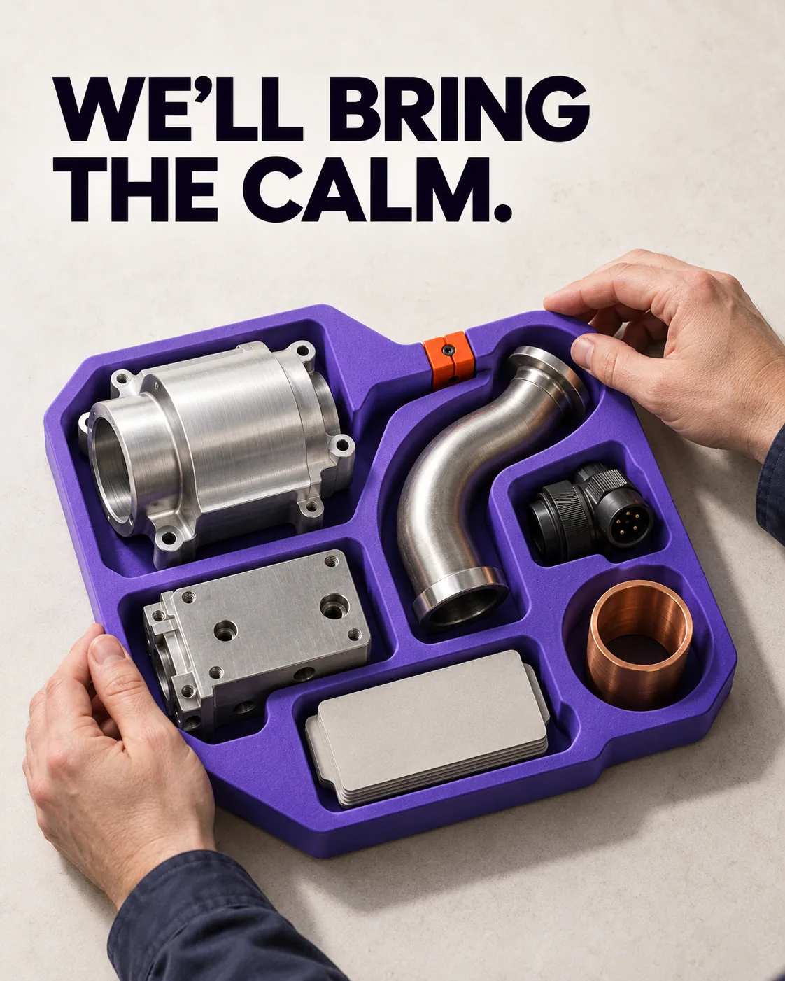 We’ll bring the calm. Hands hold an organised violet tray of fitted components.